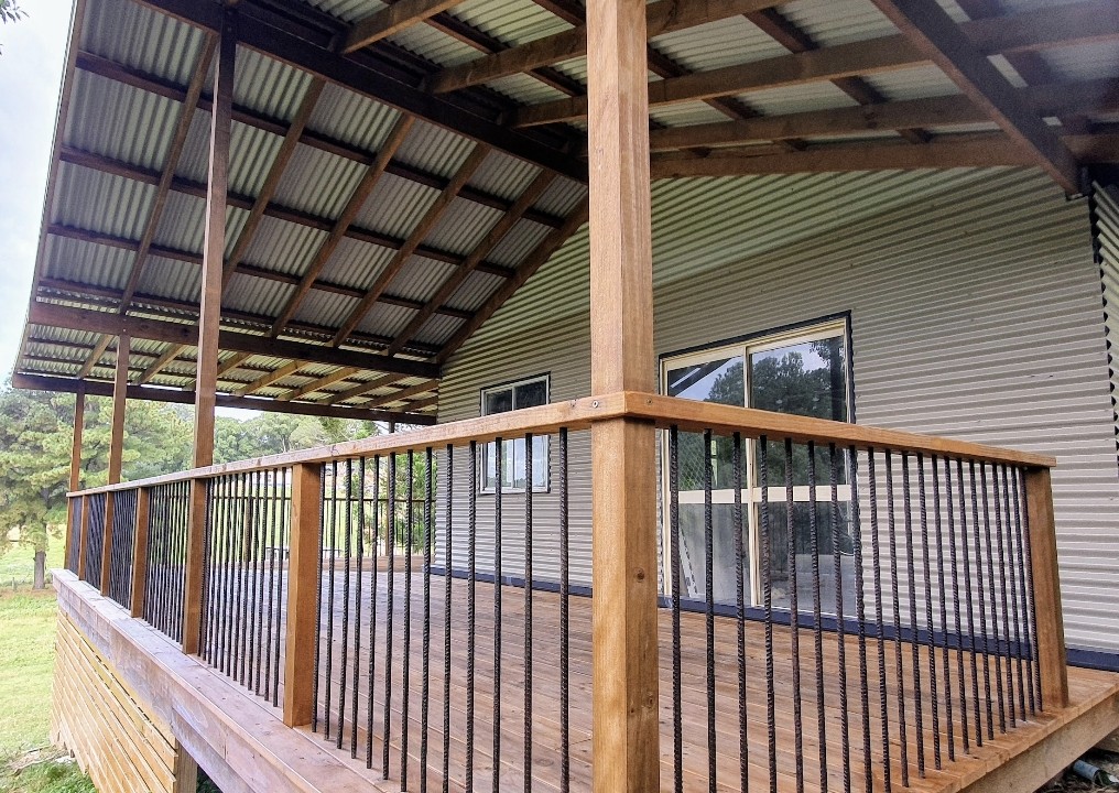 Verandah roof and deck with hardwood posts and rebar balustrade